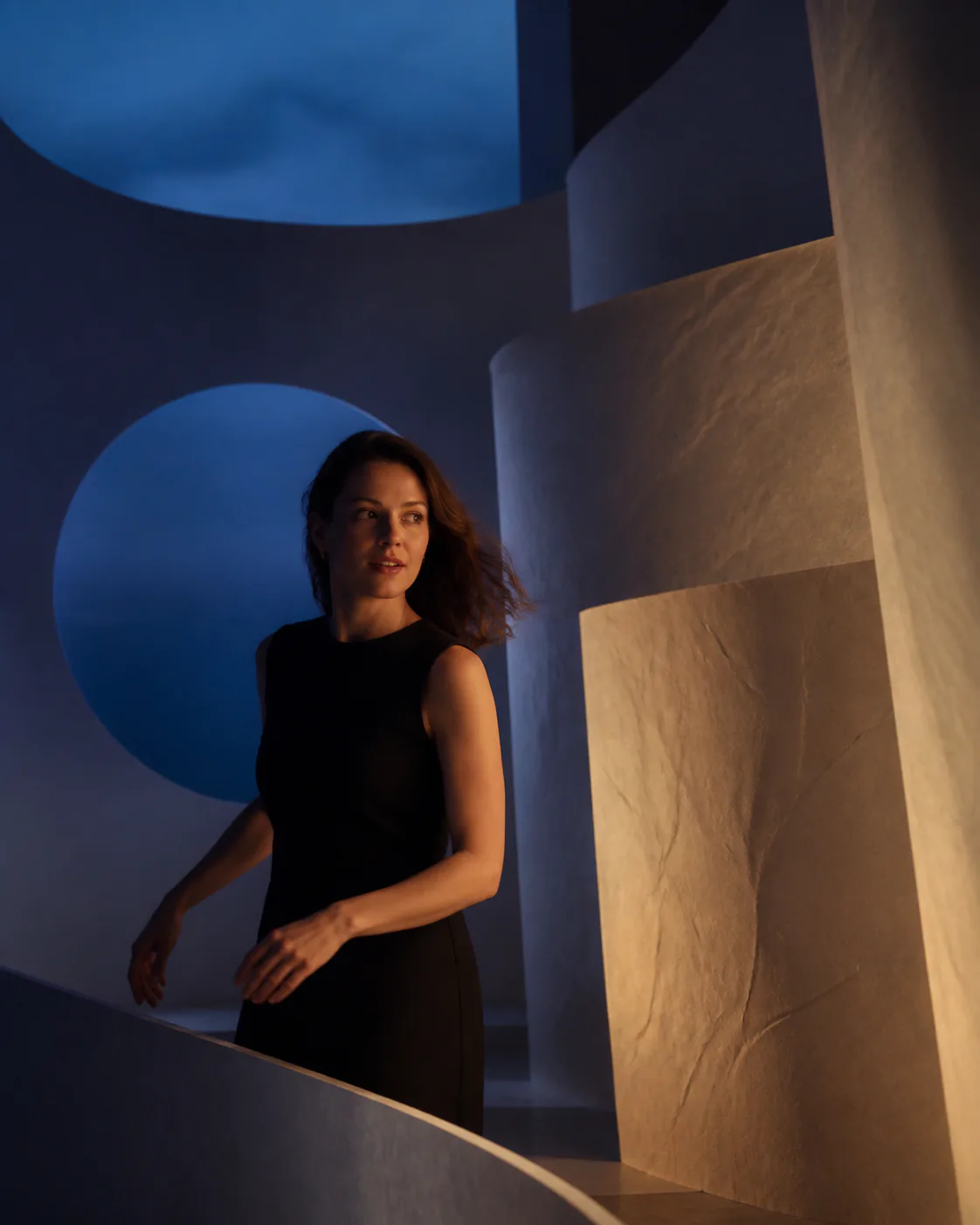 Staged world example: a woman in a futuristic setting with blue lighting